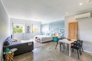 Family Suite, River View | In-room safe, blackout drapes, soundproofing, iron/ironing board