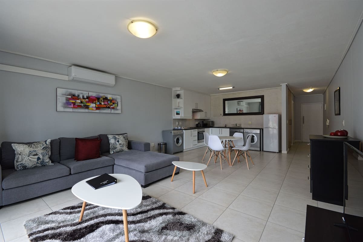 Apartment, 1 Bedroom (Dockside) | Living room | LED TV