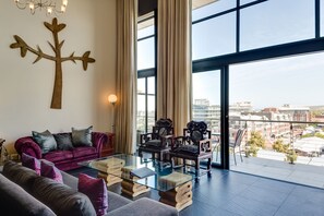 Penthouse, 2 Bedrooms (Rockwell) | Living room | LED TV - De Waterkant Luxury Apartments (Cape Town)