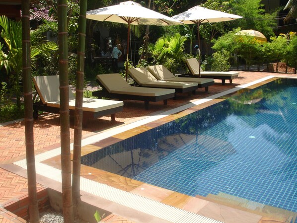 Outdoor pool, pool umbrellas, pool loungers