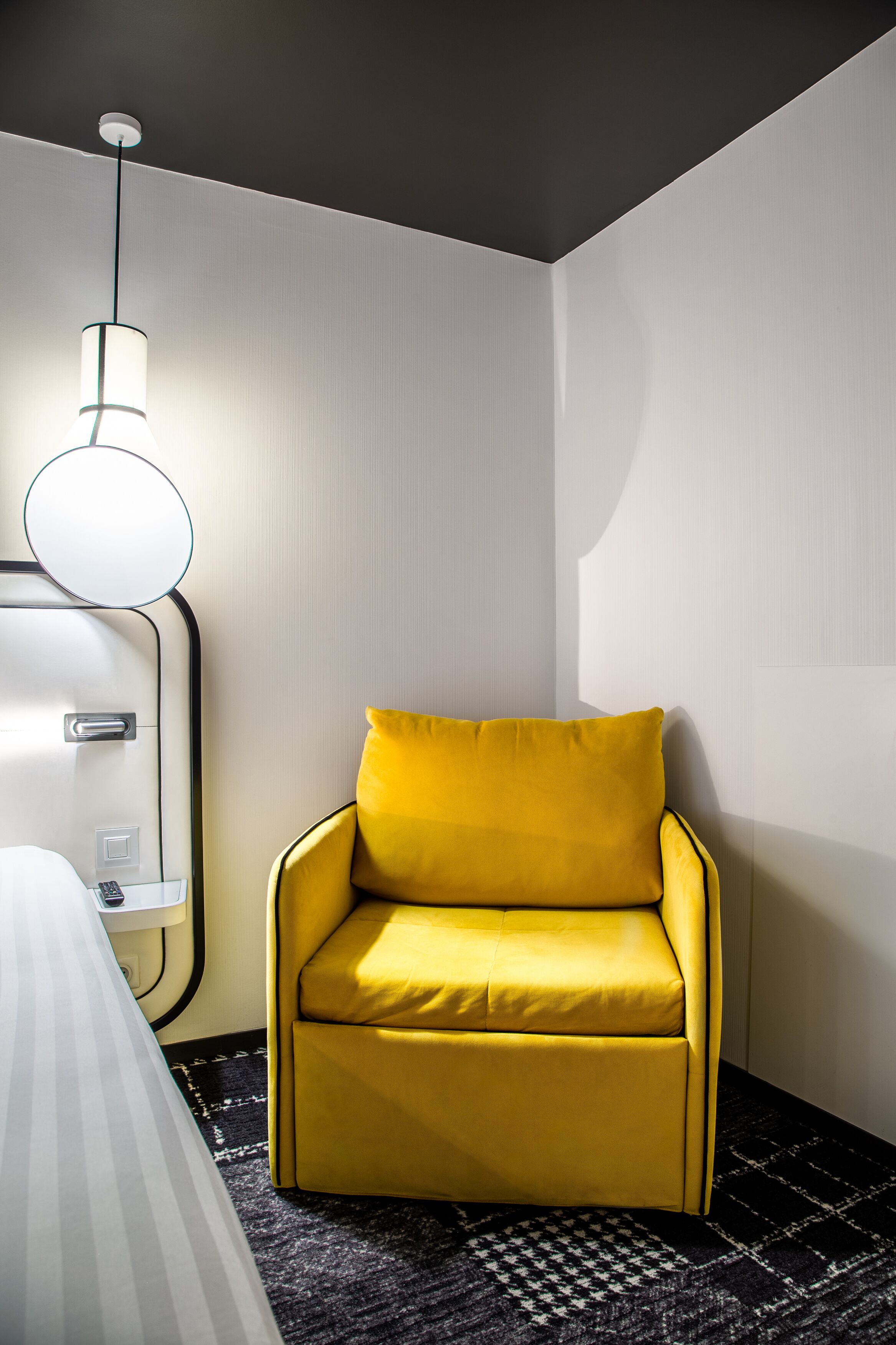 deluxe triple room | living area | flat-screen tv