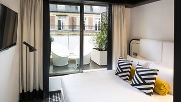 Ropa de cama de alta calidad y minibar