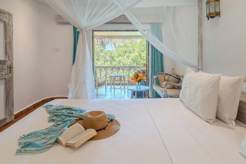 Garden Room | Premium bedding, minibar, in-room safe, individually decorated