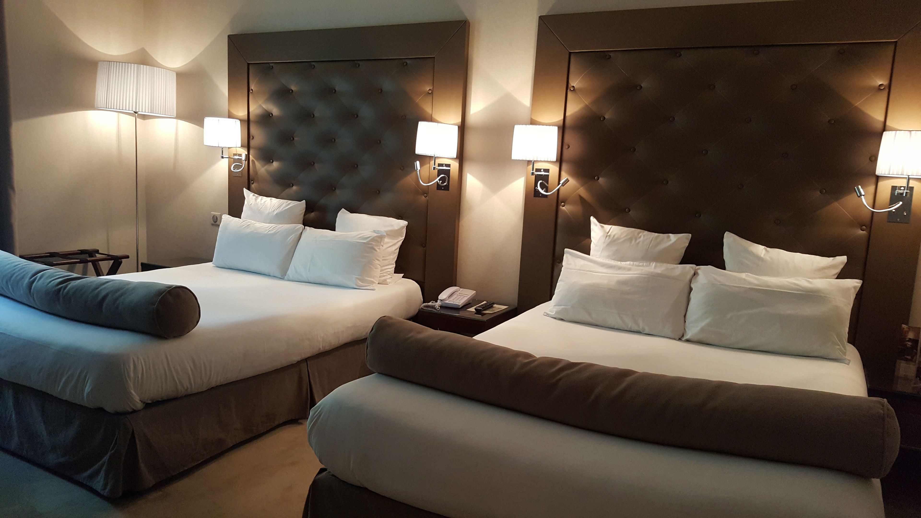 family room | premium bedding, minibar, in-room safe, desk