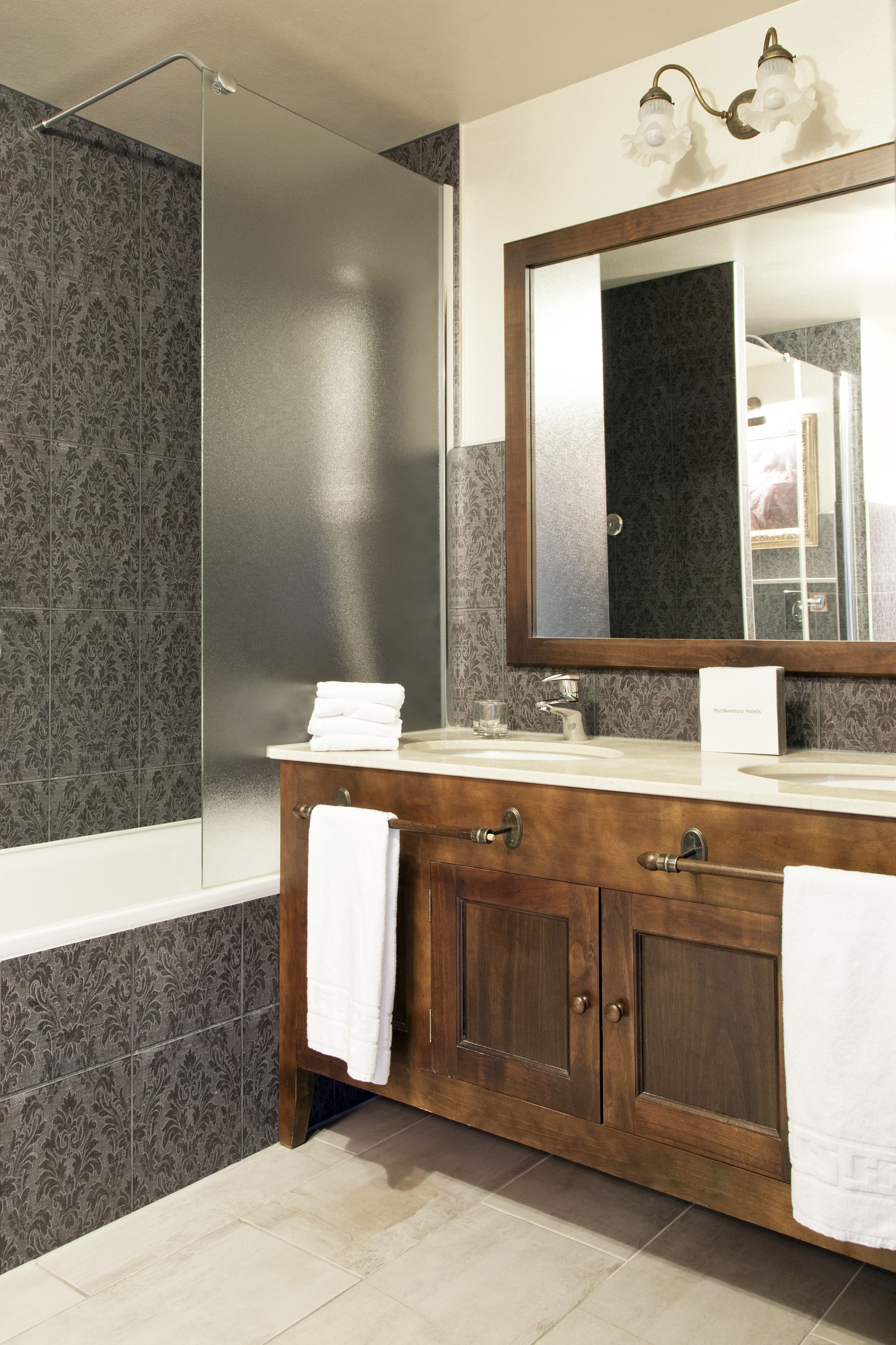 separate bathtub and shower, designer toiletries, hair dryer, bathrobes