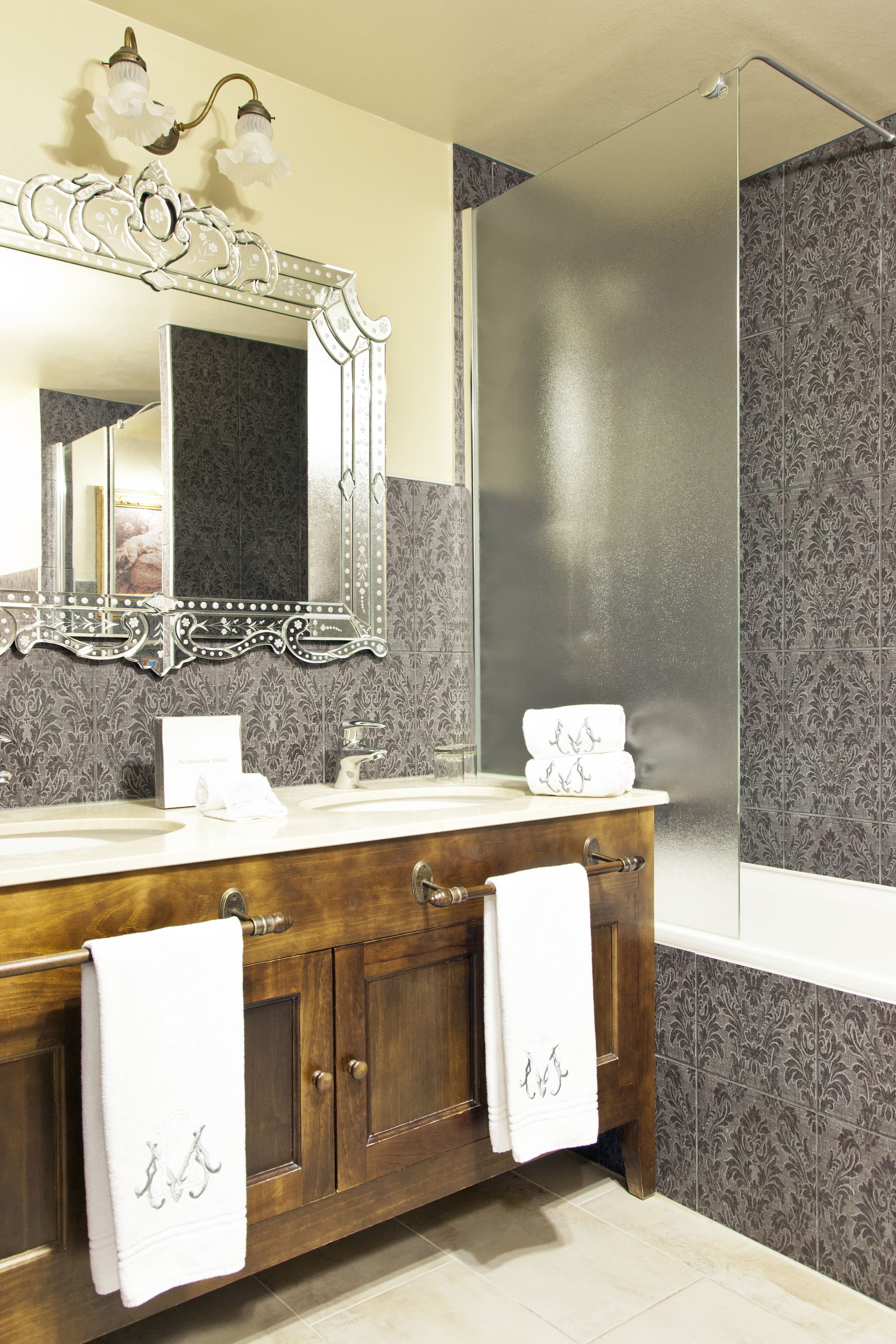 separate bathtub and shower, designer toiletries, hair dryer, bathrobes