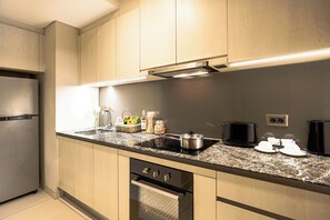 Appartamento Executive, 3 camere da letto | Cucina privata | Frigorifero, microonde, piano cottura, bollitore elettrico