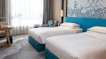 Premium bedding, down duvets, minibar, in-room safe