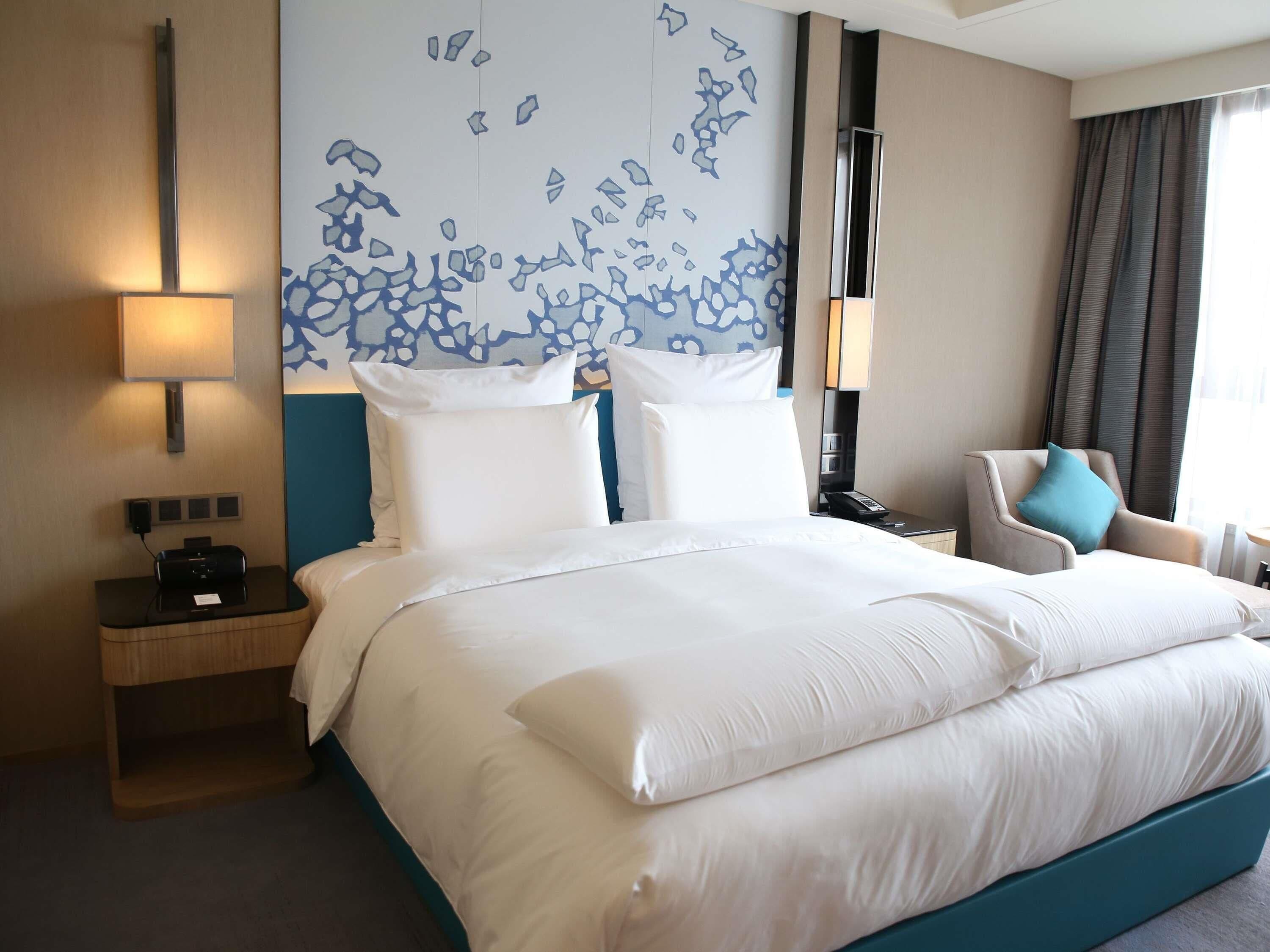 Premium bedding, down duvets, minibar, in-room safe