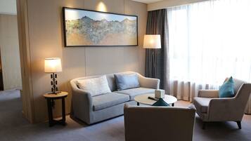 Deluxe Suite, 1 King Bed, Club Lounge Access | Premium bedding, down comforters, minibar, in-room safe