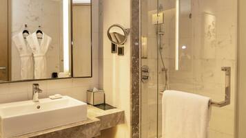 Premium bedding, down comforters, minibar, in-room safe
