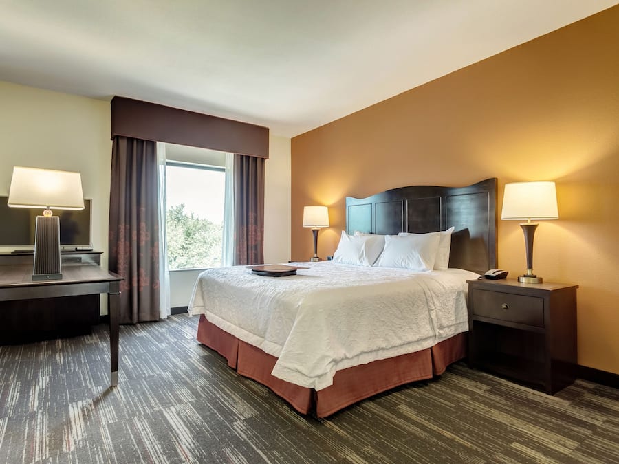 Hypo-allergenic bedding, pillow-top beds, in-room safe