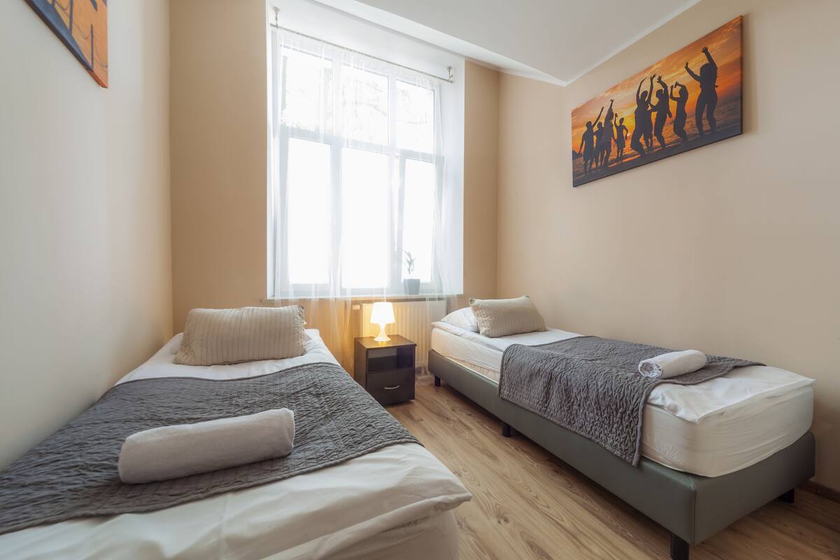 Twin Room, Ground Floor (003 Railway tracks view) | Down comforters, iron/ironing board (on request), WiFi (free)