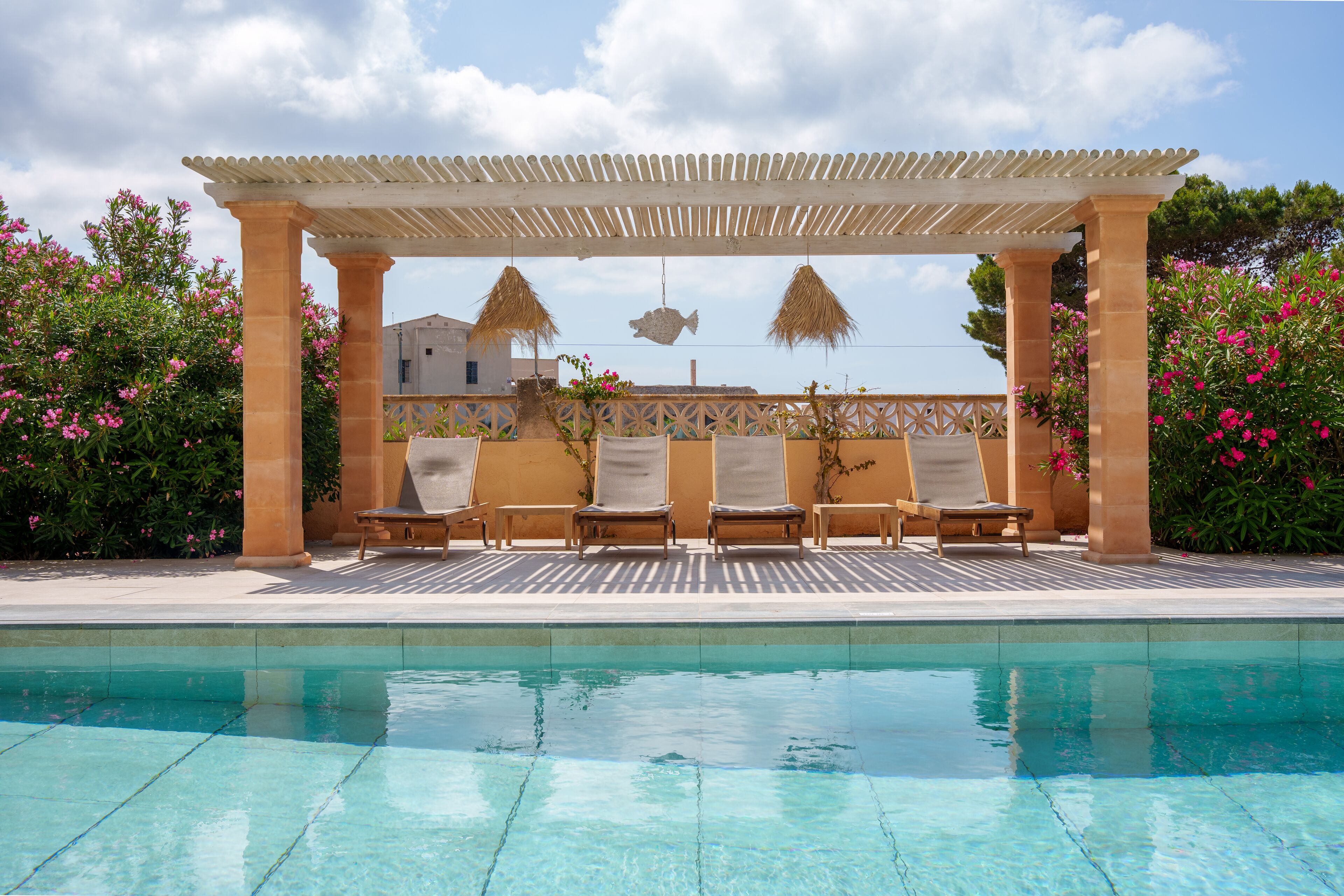 Seasonal outdoor pool, pool loungers