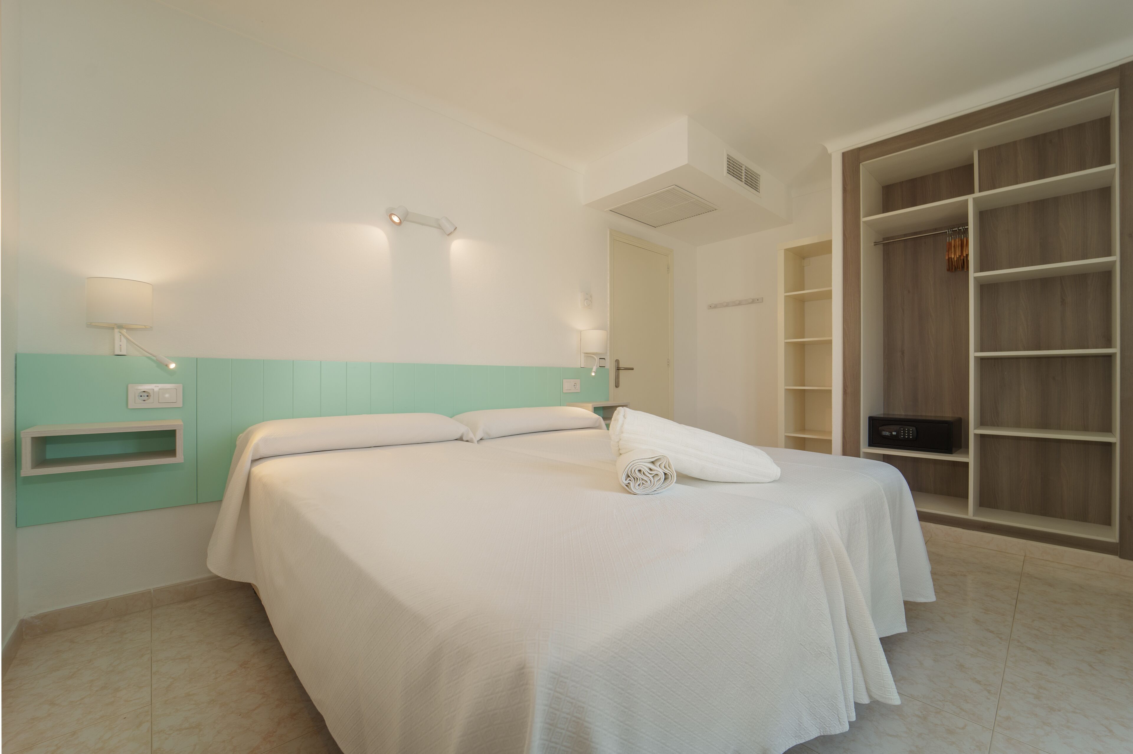 apartment, 1 bedroom, balcony | 1 bedroom, desk, blackout curtains, iron/ironing board