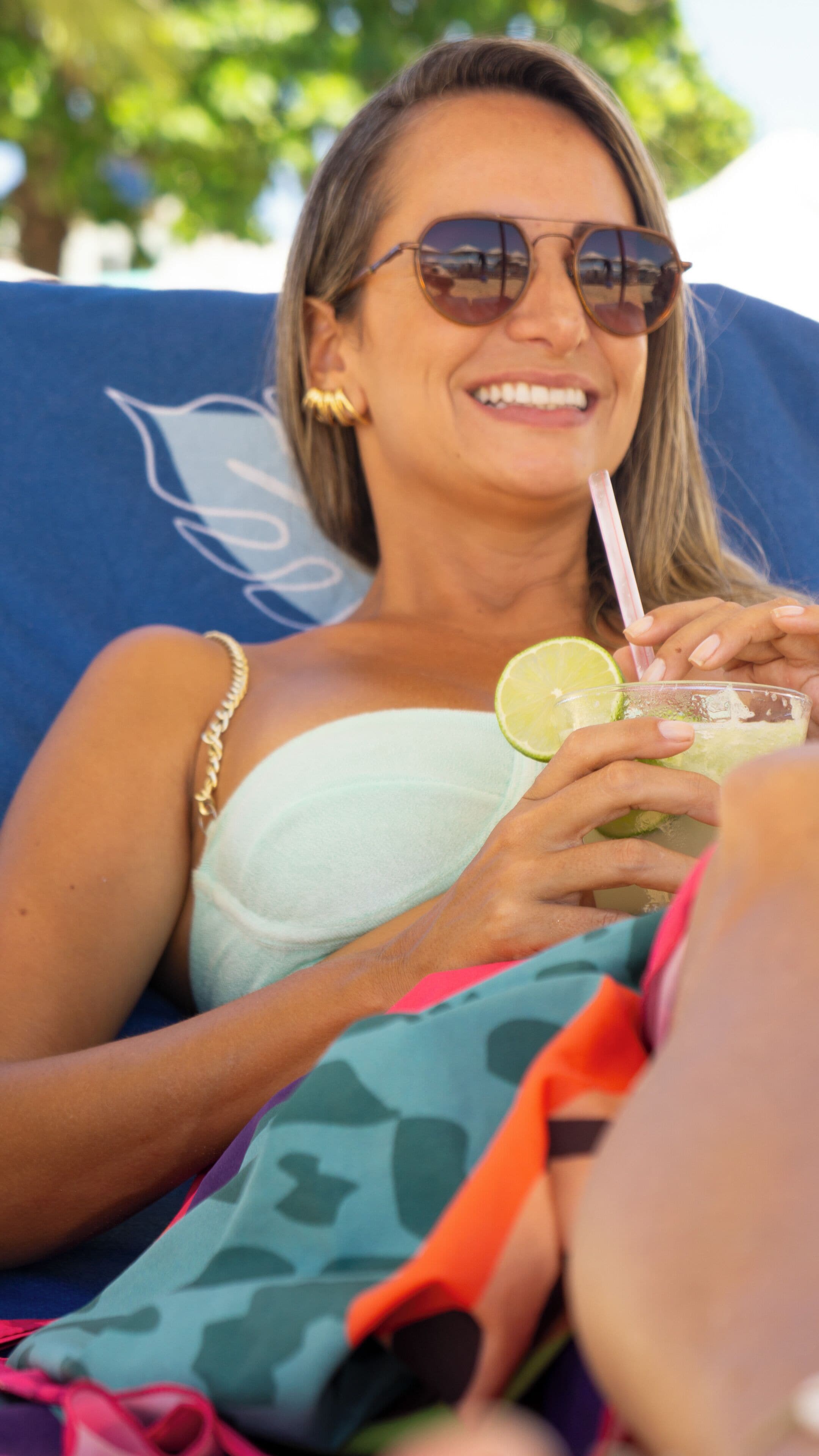 on the beach, sun-loungers, beach umbrellas, beach towels