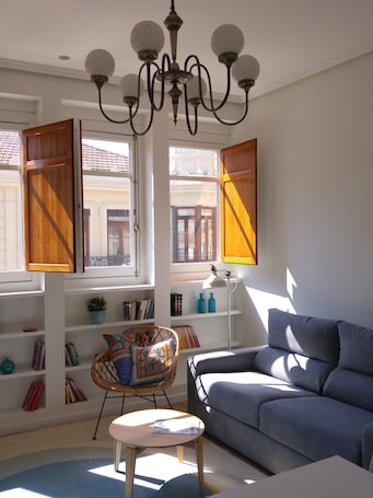 Family Apartment, 1 Bedroom | Living room | 40-inch flat-screen TV with satellite channels, TV