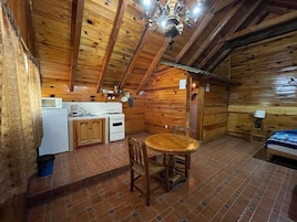 Chalet, 1 King Bed, Fireplace | Private kitchen | Full-size fridge, stovetop, cookware/dishes/utensils
