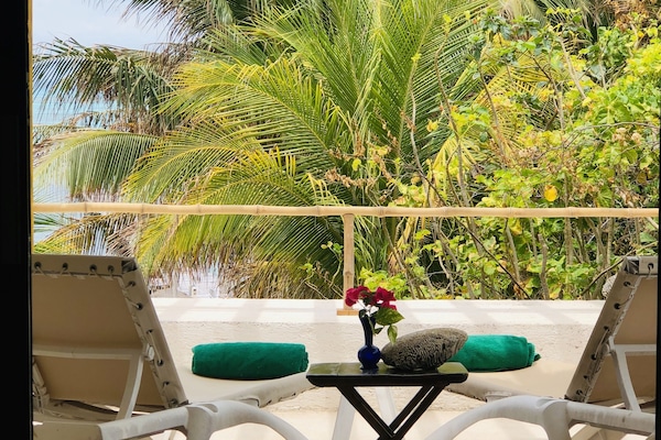 Suíte romântica, vista para a praia | Terraço/pátio