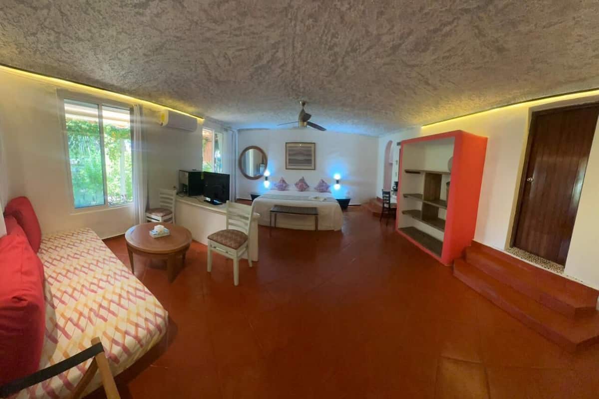 Elite Triple Room, 2 Bedrooms, Garden View | 1 bedroom, minibar, blackout drapes, soundproofing