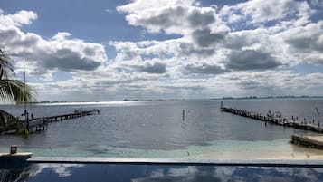 Outdoor pool, open 8:00 AM to 7:00 PM, pool loungers