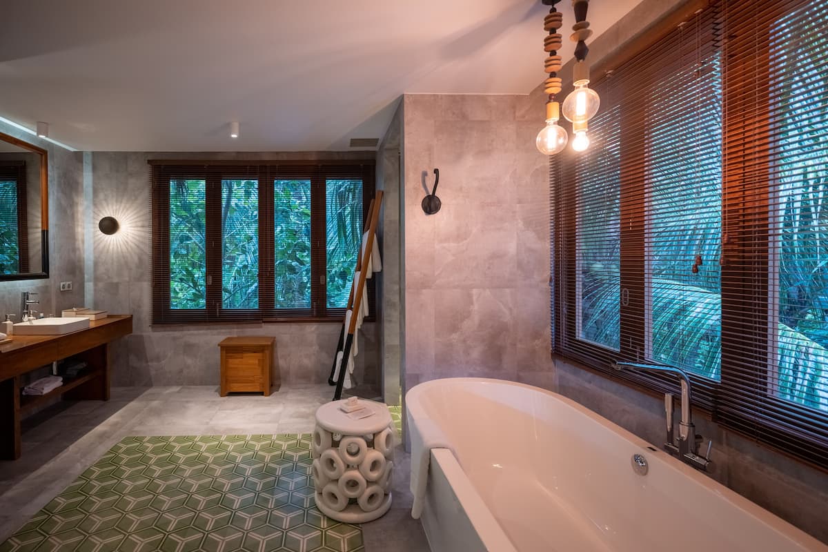 separate bathtub and shower, deep-soaking bathtub, free toiletries