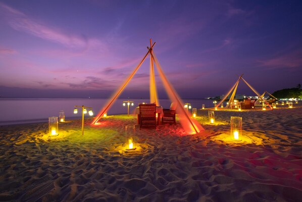 On the beach, white sand, free beach cabanas, sun loungers