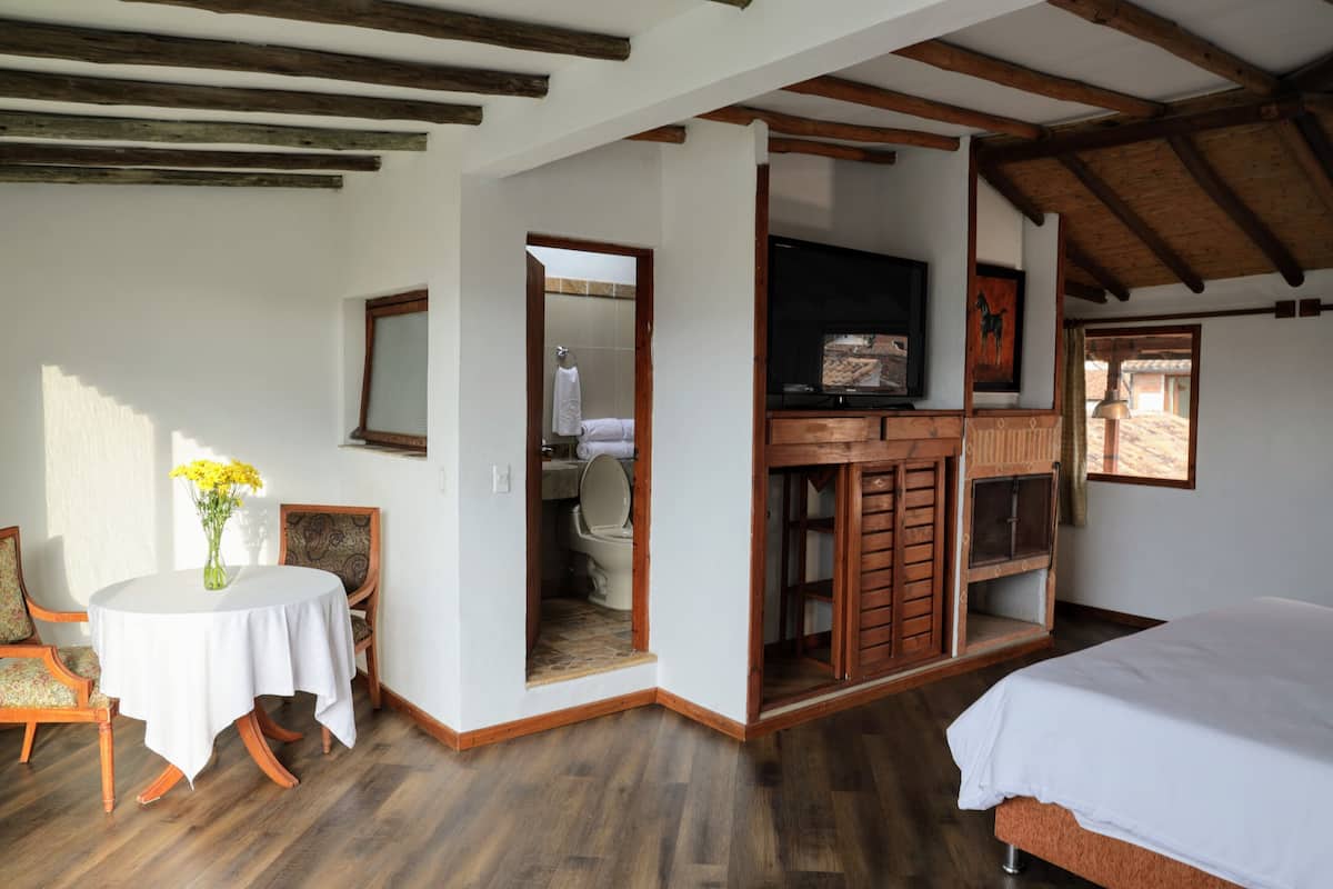 Junior Studio Suite | Premium bedding, desk, laptop workspace, free cots/infant beds