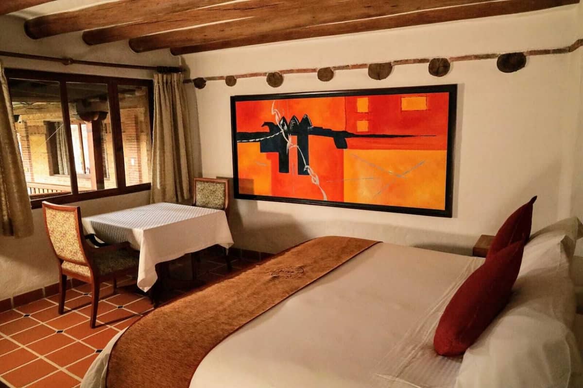 Comfort Double Room | Premium bedding, desk, laptop workspace, free cots/infant beds