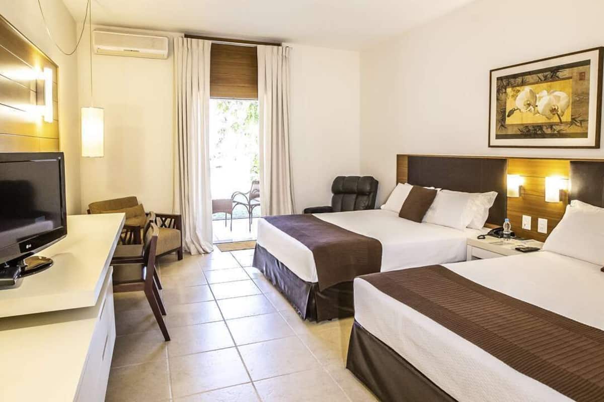 Super Luxo 2 Camas Casal | Een minibar, een kluis op de kamer, geluiddichte muren, gratis wifi