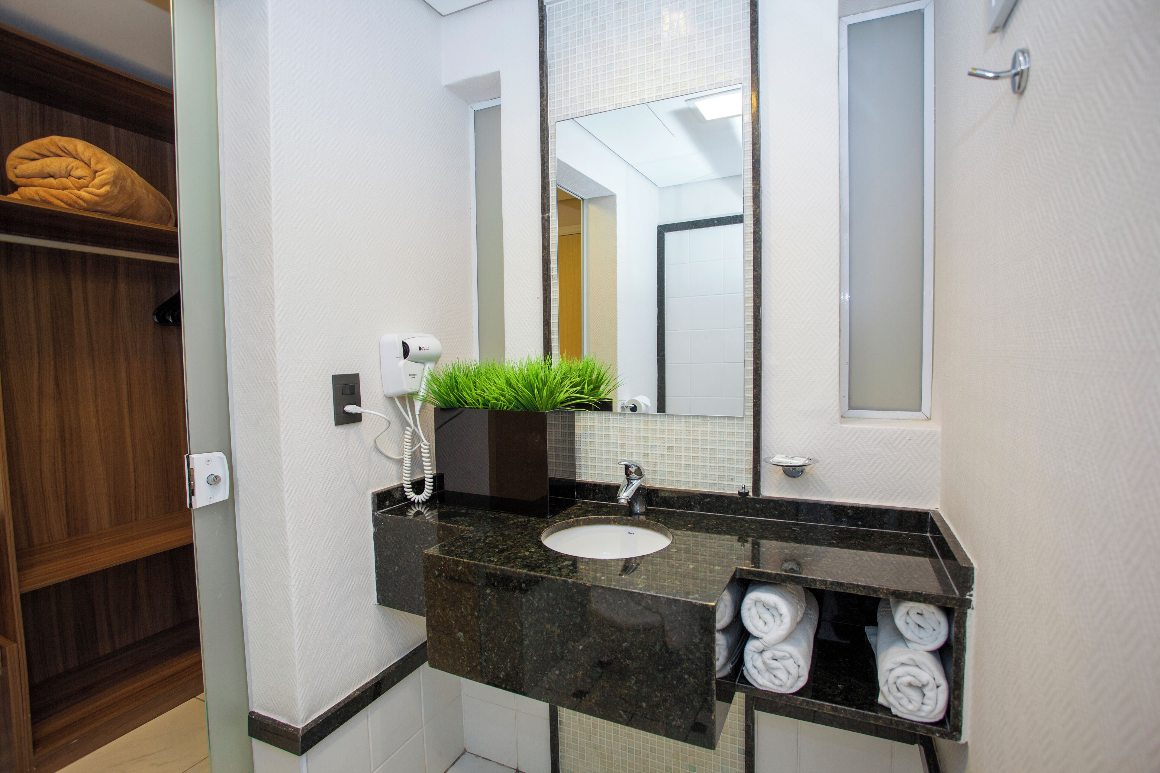 hair dryer, towels, soap, shampoo