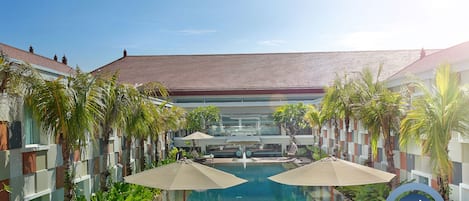 Outdoor pool, open 8:00 AM to 8:00 PM, pool umbrellas, pool loungers