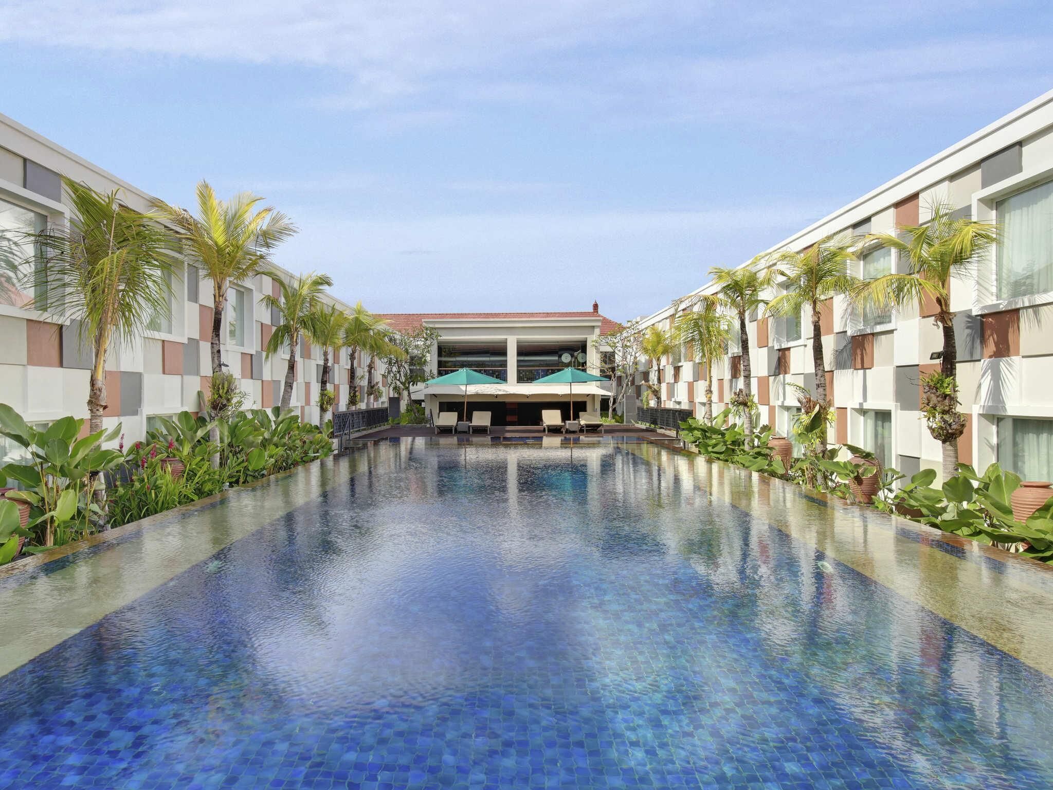 Outdoor pool, open 8:00 AM to 8:00 PM, pool umbrellas, pool loungers