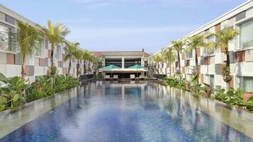 Outdoor pool, open 8:00 AM to 8:00 PM, pool umbrellas, pool loungers