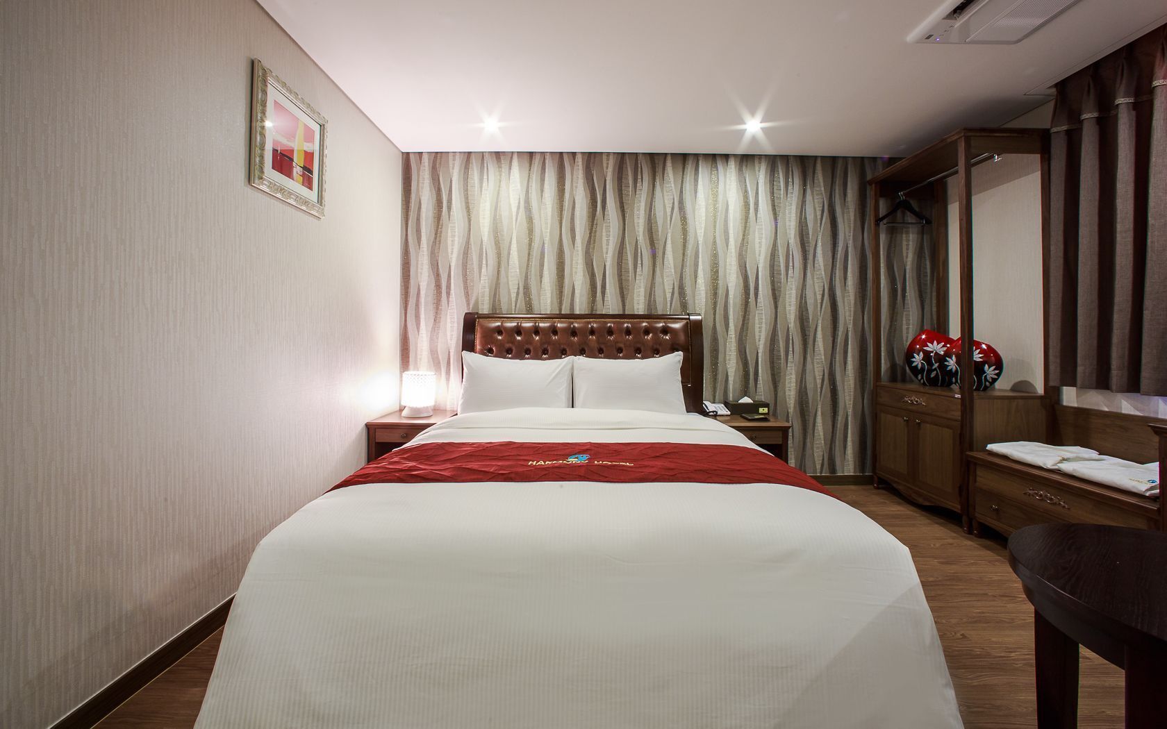 Premium bedding, down comforters, soundproofing, free WiFi