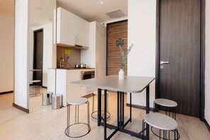 3 Bedroom Apartment with Laundry Room | Living area | 40-inch LCD TV with cable channels, TV - Louis Kienne Serviced Residences (Singapore)