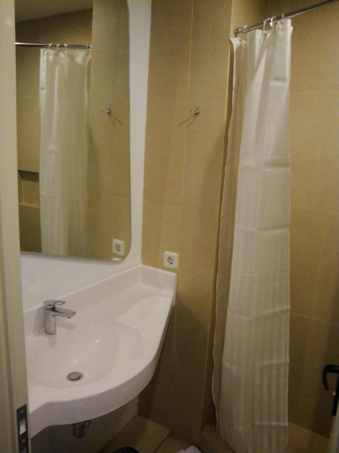 Shower, free toiletries, hair dryer, slippers