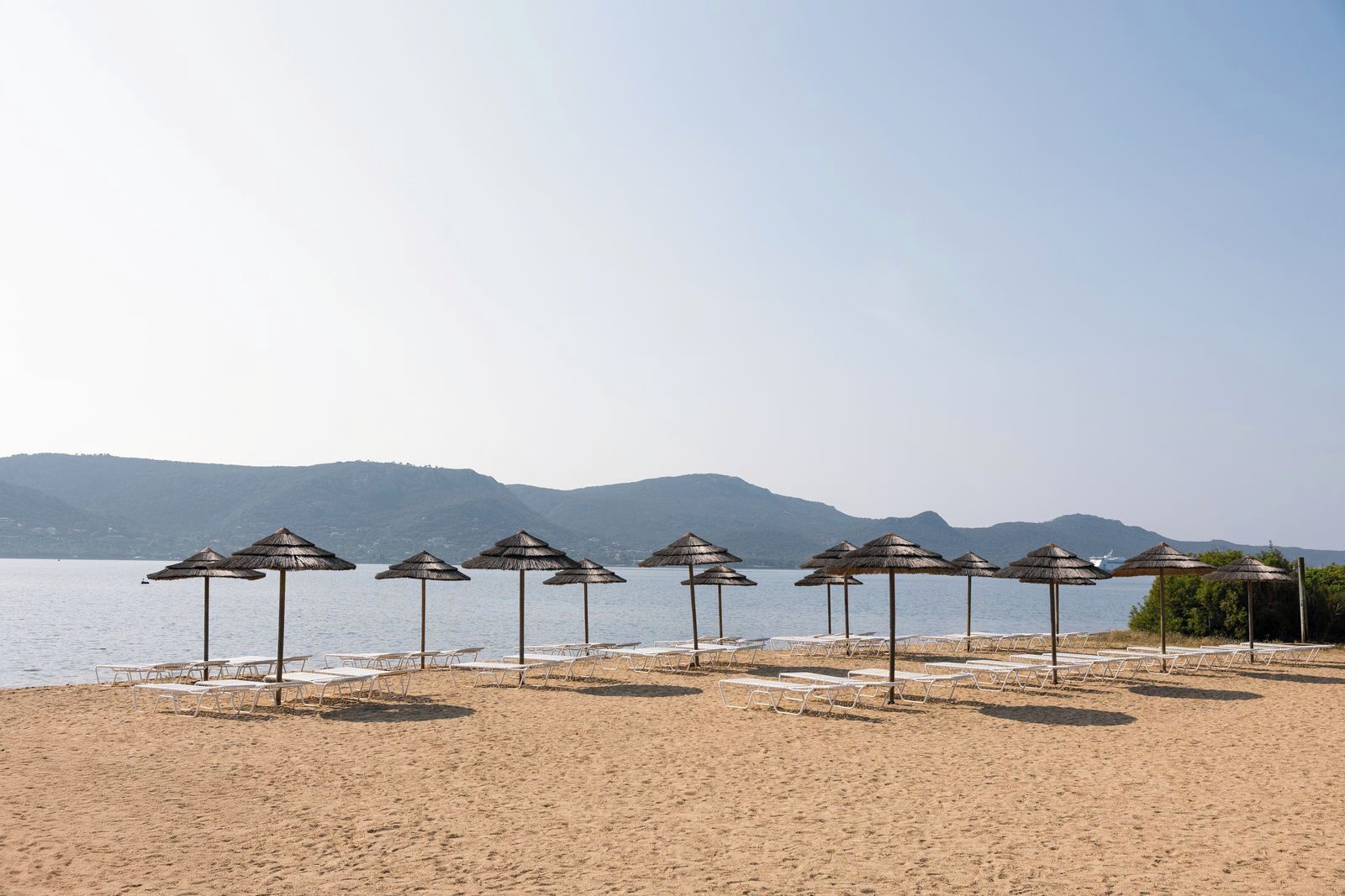 private beach, sun-loungers, beach umbrellas, beach yoga