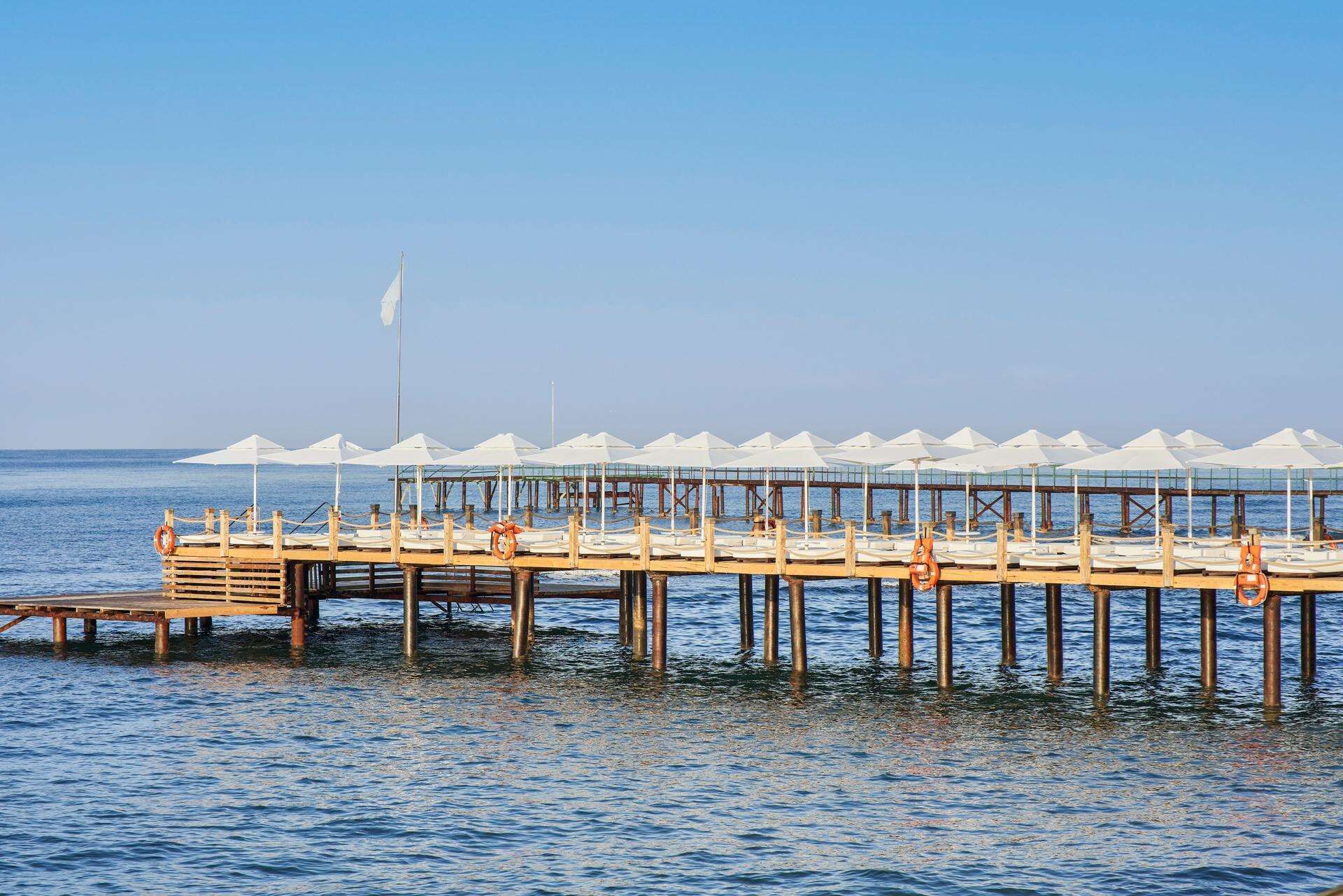 private beach, sun-loungers, beach umbrellas, beach towels