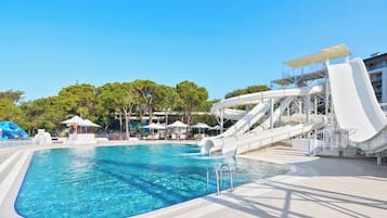 Indoor pool, 7 outdoor pools, open 7:00 AM to 7:00 PM, pool umbrellas