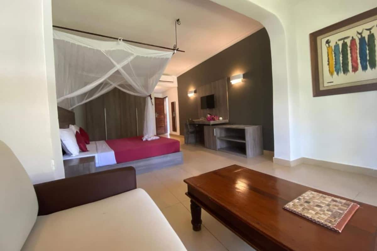 Triple Room | Free minibar items, in-room safe, desk, laptop workspace