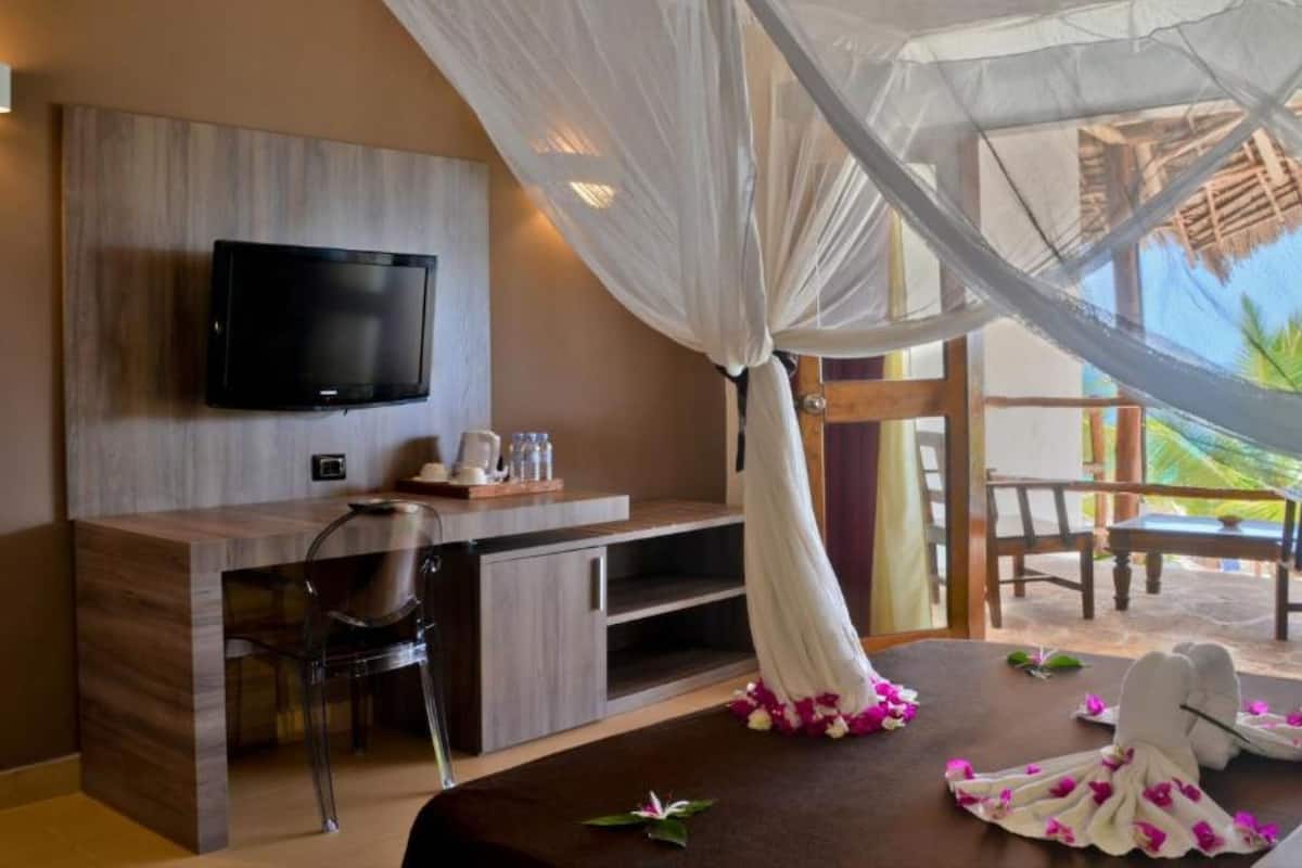 Free minibar items, in-room safe, desk, laptop workspace