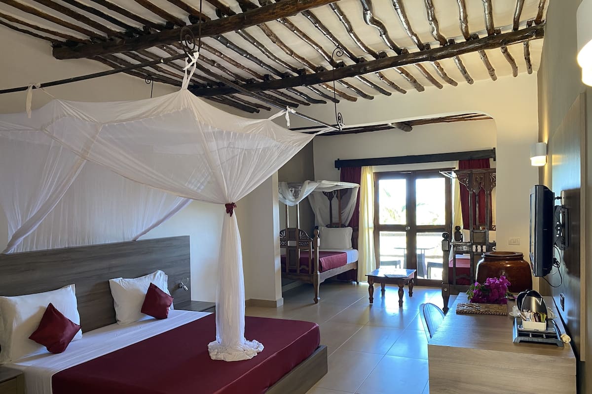 Free minibar items, in-room safe, desk, laptop workspace