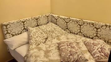 Luxe beddengoed, een minibar, een strijkplank/strijkijzer, gratis wifi