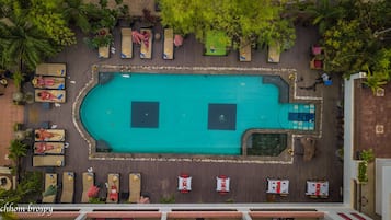 Outdoor pool, a natural pool, pool loungers