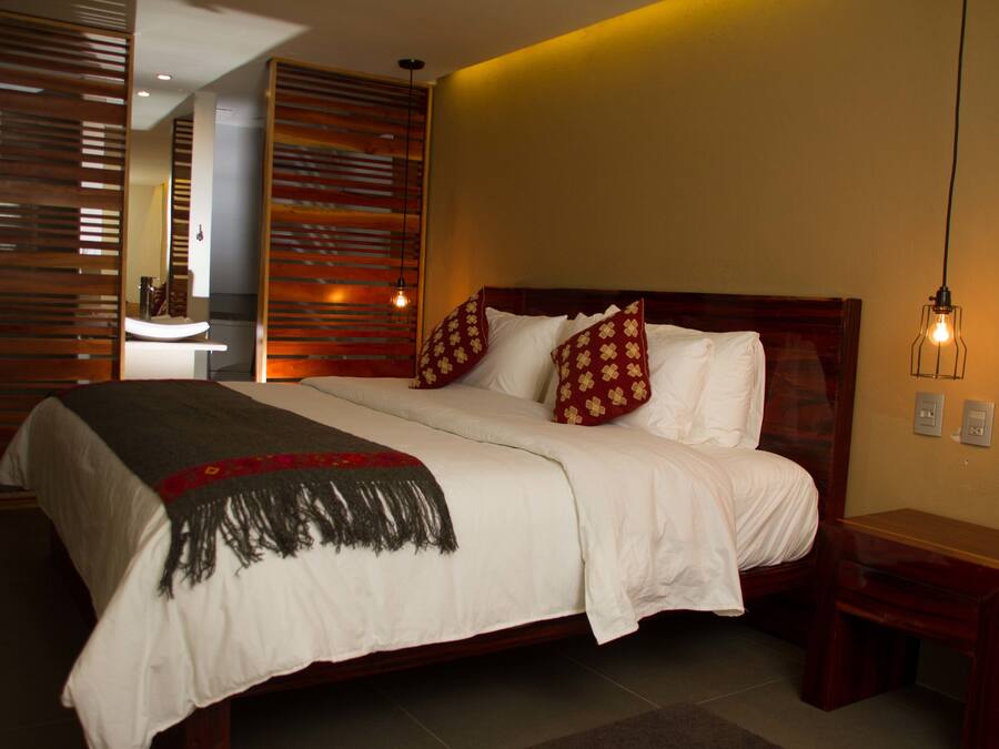 Premium bedding, down duvets, desk, iron/ironing board (on request)