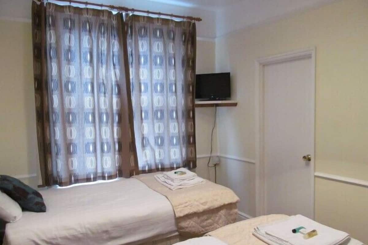 Standard Twin Room, 2 Single Beds | Desk, blackout curtains, iron/ironing board (on request), free WiFi