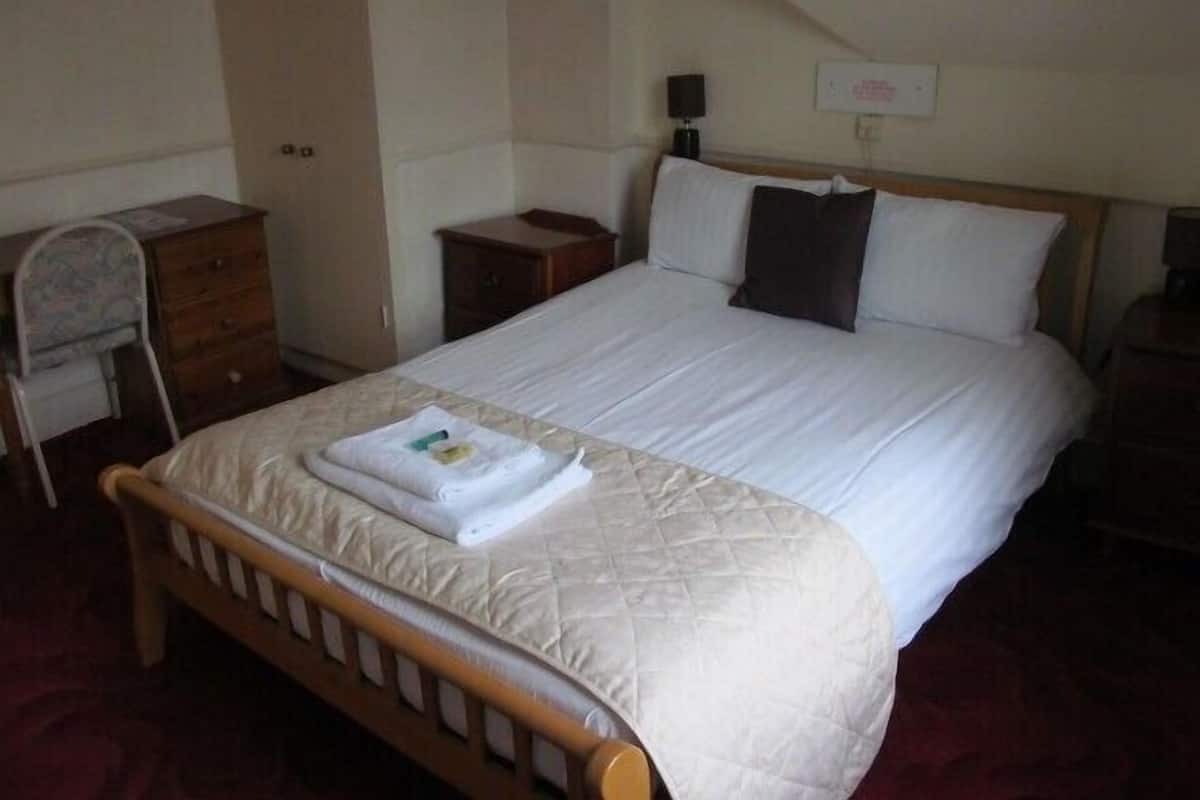 Standard Double Room | Desk, blackout curtains, iron/ironing board (on request), free WiFi