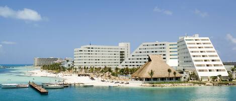 On the beach, sun loungers, beach towels