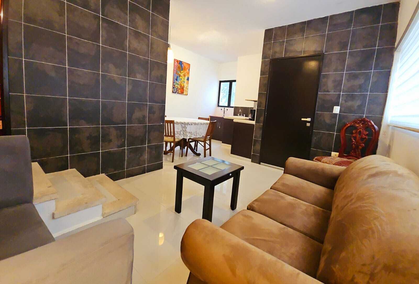 junior studio suite, 1 king bed, refrigerator, garden view | living area | 32-inch lcd tv with cable channels, tv